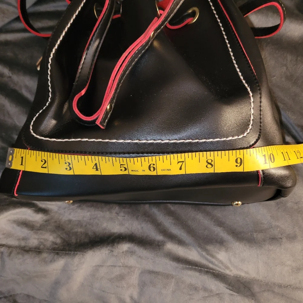 Mellow World Black Bucket Purse Red Fabric Lining Snap Closure Dooney Lookalike